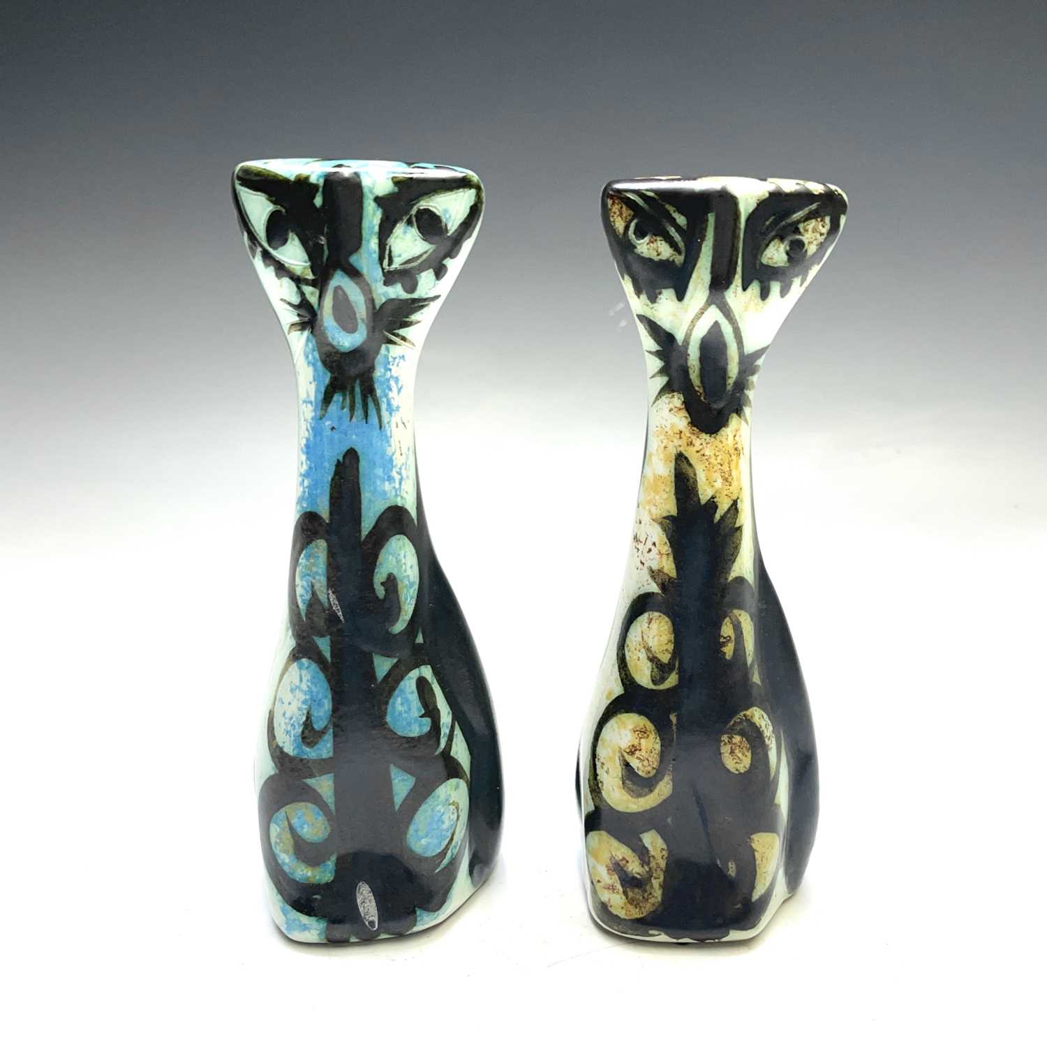 Lot 985 - Two Celtic Newlyn pottery figures of stylised...