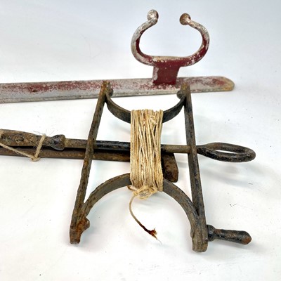 Lot 104 - A wrought iron garden string line and winder,...