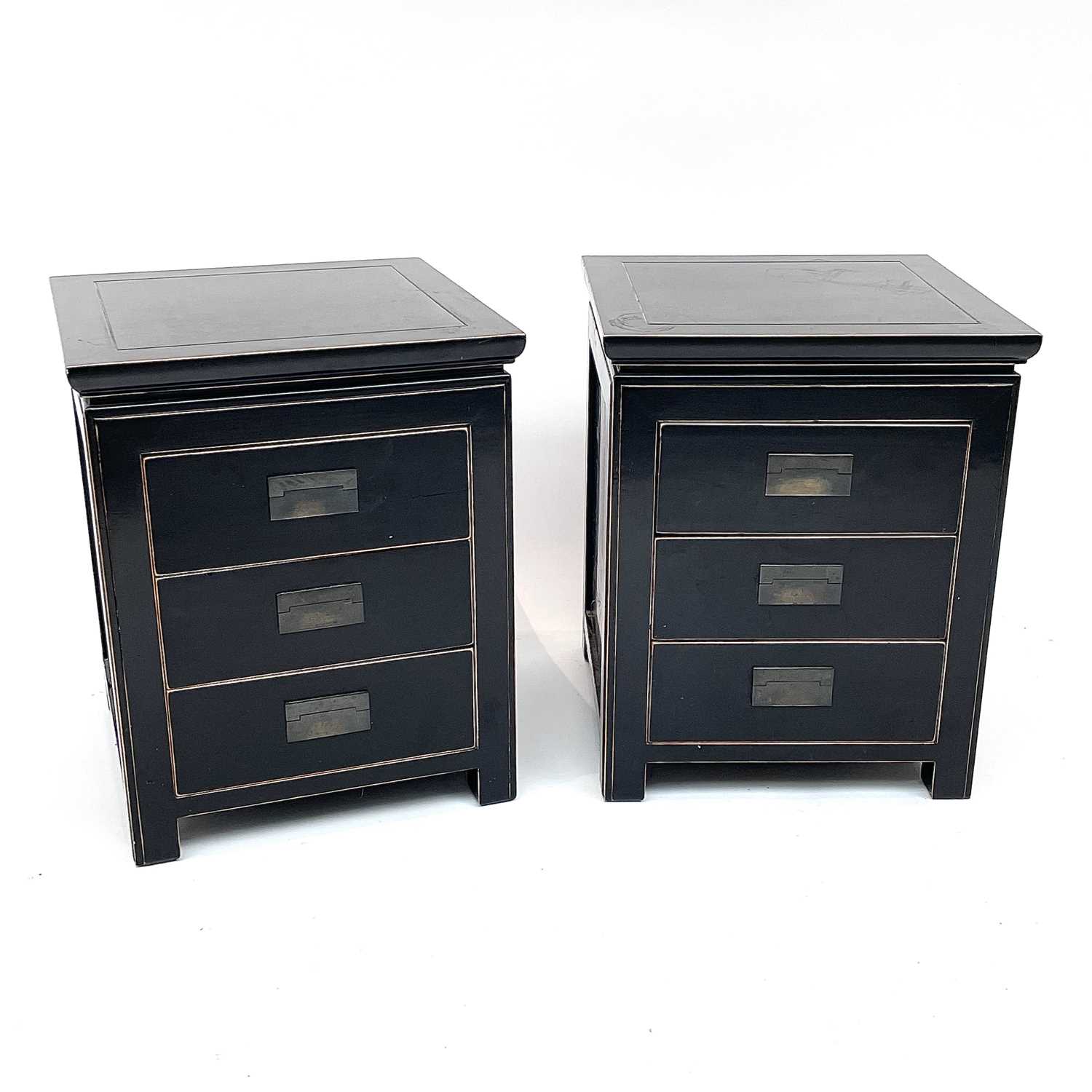 Lot 3045 - A pair of OKA black lacquered bedside chests,...