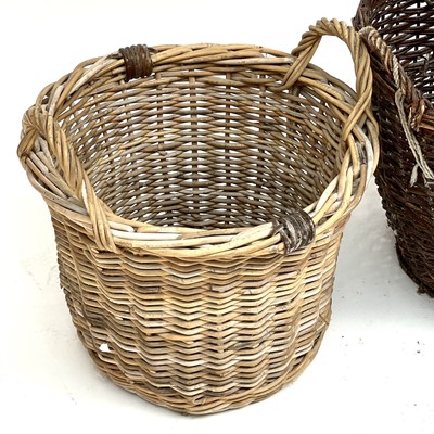 Lot 95 - A two handled wicker basket together with...
