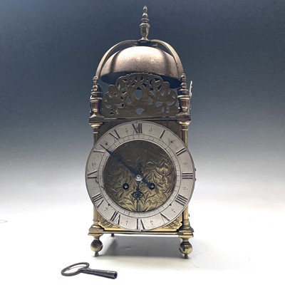 Lot 2904 - A brass lantern style clock, circa 1900, the...