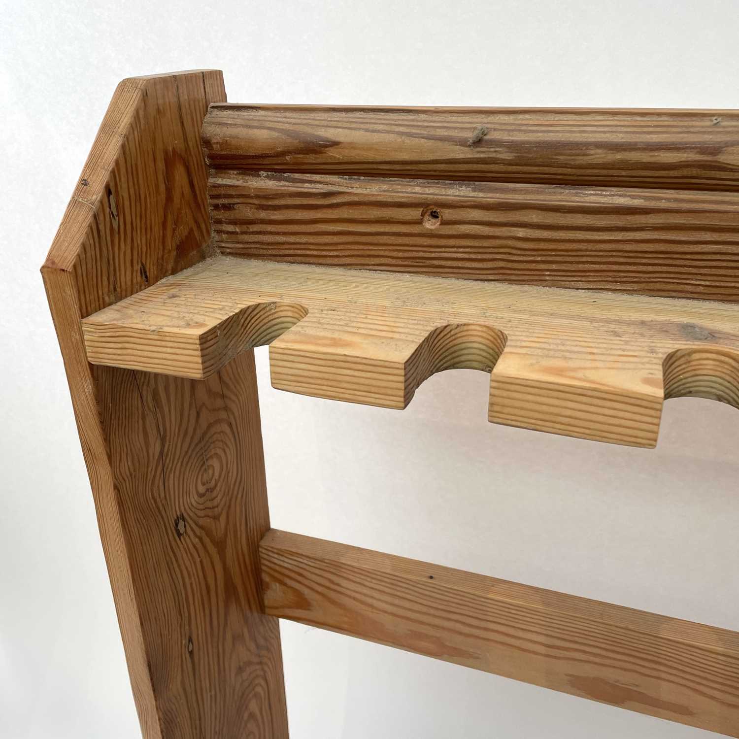 Lot 132 - A custom made pine gun rack, to hold six