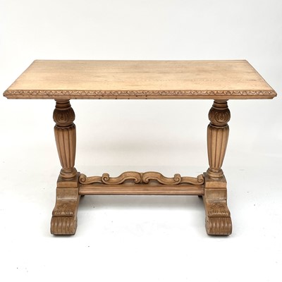 Lot 3072 - A continental oak carved centre table on...