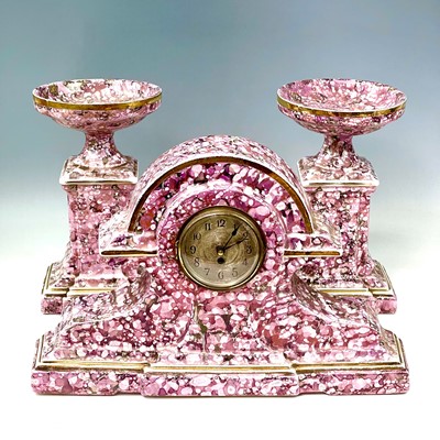 Lot 845 - A French pink lustre three-piece clock set,...