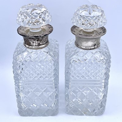 Lot 52 - A pair of modern cut glass whisky decanters...