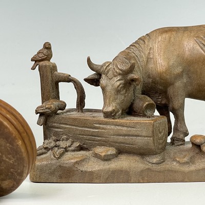 Lot 33 - A Continental linden wood carving of a cow at...