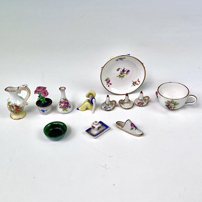 Lot 836 - A Meissen porcelain miniature cup and saucer,...