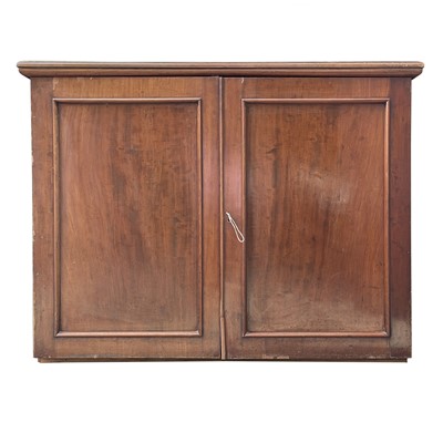 Lot 58 - A Victorian mahogany cupboard with two doors...