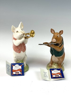 Lot 995 - A collection of seven Beswick pottery pig band...