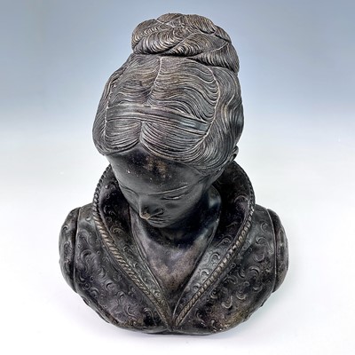 Lot 190 - A cast metal bust of a woman, height 37cm.