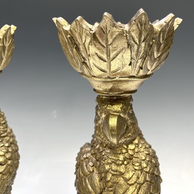 Lot 179 - A pair of gold painted parrot candleholders,...