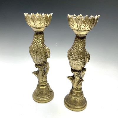 Lot 179 - A pair of gold painted parrot candleholders,...