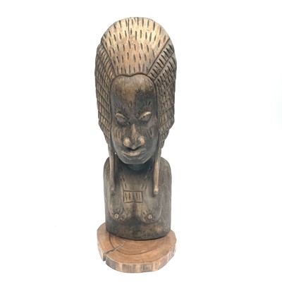 Lot 187 - An African wood carved tribal bust of a woman,...