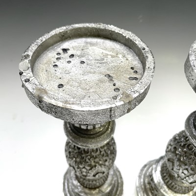 Lot 204 - A pair of silver painted candlesticks with...