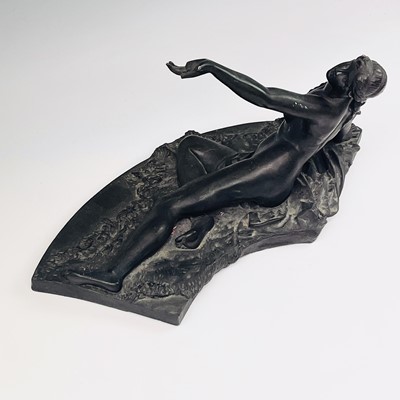 Lot 196 - A resin cast of a neo classical reclining...