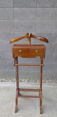 Lot 18 - A Butlers Valet Stand. In Dark Wood, it...