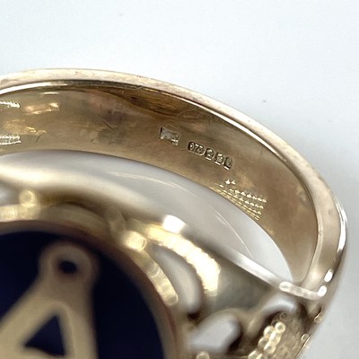 Lot 201 - A 9ct hallmarked gold and black enamel...