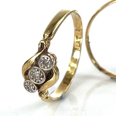 Lot 117 - A 22ct gold band ring, 1.2g, together with an...