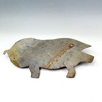 Lot 222 - A sheet metal silhouette of a pig, 45cm x 25cm.