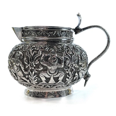 Lot 1000 - An Indian Madras silver jug, circa 1900.