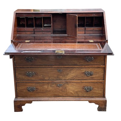 Lot 3100 - A George III mahogany bureau, the fall front...