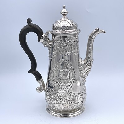 Lot 41 - A George II silver baluster coffee pot...