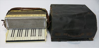 Lot 240 - A Mazzini piano accordion with case.