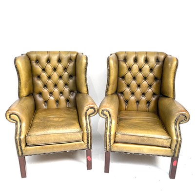 Lot 3113 - A pair of George III style leather upholstered...