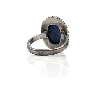 Lot 258 - A Persian silver and gilt filigree Lapis...