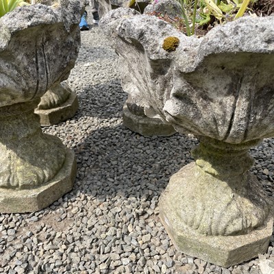 Lot 615 - A set of four reconstituted stone lotus leaf...
