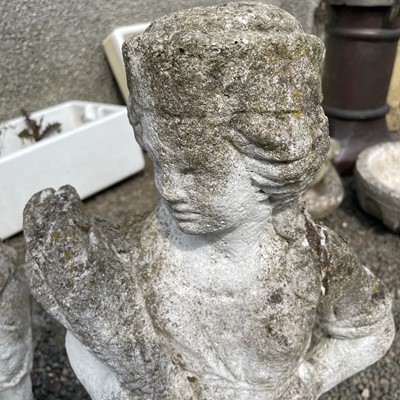 Lot 617 - A set of three reconstituted stone figures...