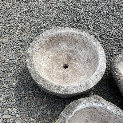 Lot 620 - A reconstituted stone mortar shape planter...