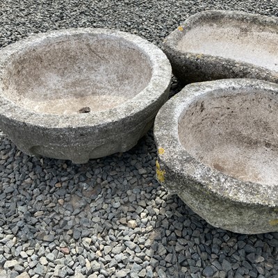 Lot 620 - A reconstituted stone mortar shape planter...