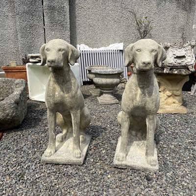 Lot 624 - A pair of reconstituted stone figures of...