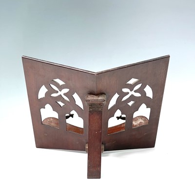 Lot 106 - A walnut table music stand with gothic arch...