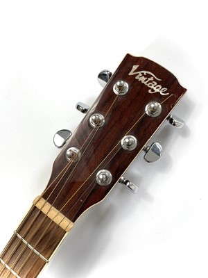Lot 58 - A 'Vintage' VEC350FSB electro acoustic guitar.