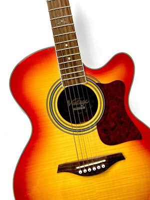 Lot 58 - A 'Vintage' VEC350FSB electro acoustic guitar.