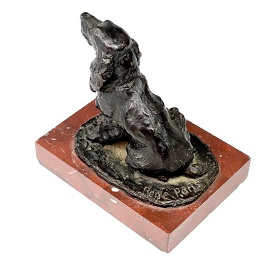 Lot 174 - A French bronze figure of a seated cocker...