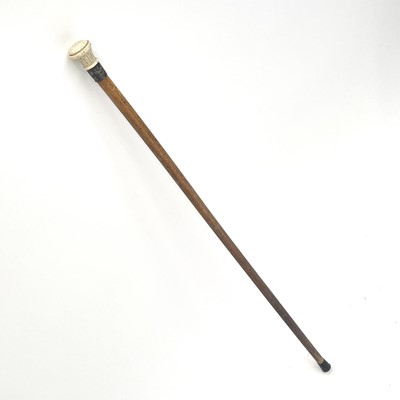 Lot 175 - A late Victorian cane, with turned ivory knop...