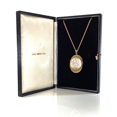 Lot 2 - A 1970's 9ct hallmarked gold oval pendant...