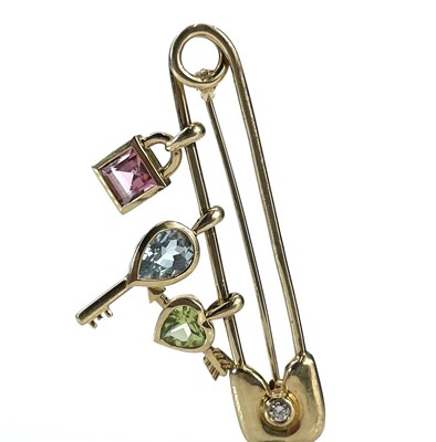 Lot 152 - A modern 18ct gold Continental safety pin...