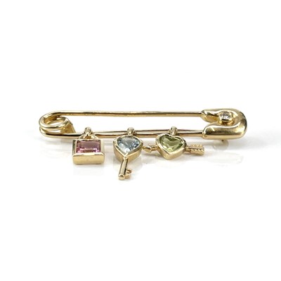 Lot 152 - A modern 18ct gold Continental safety pin...