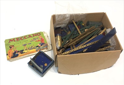 Lot 503 - Meccano - a quantity of blue and gold pieces...