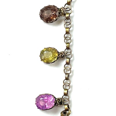 Lot 58 - A gold multiple specimen gem set necklace, the...
