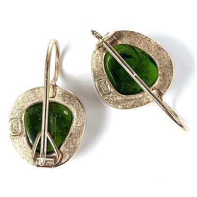 Lot 113 - A pair of gold and carved green stone earrings,...