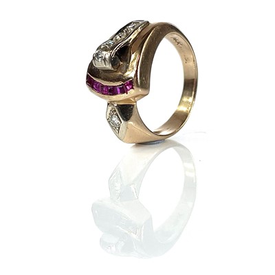 Lot 167 - A 14k gold ruby and diamond ring.