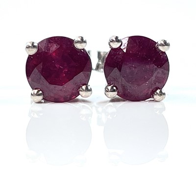 Lot 191 - A pair 18ct white gold fine ruby ear studs,...