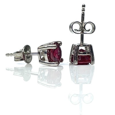 Lot 191 - A pair 18ct white gold fine ruby ear studs,...