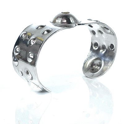 Lot 231 - A 999 fine silver Viking bracelet by James Suddaby.