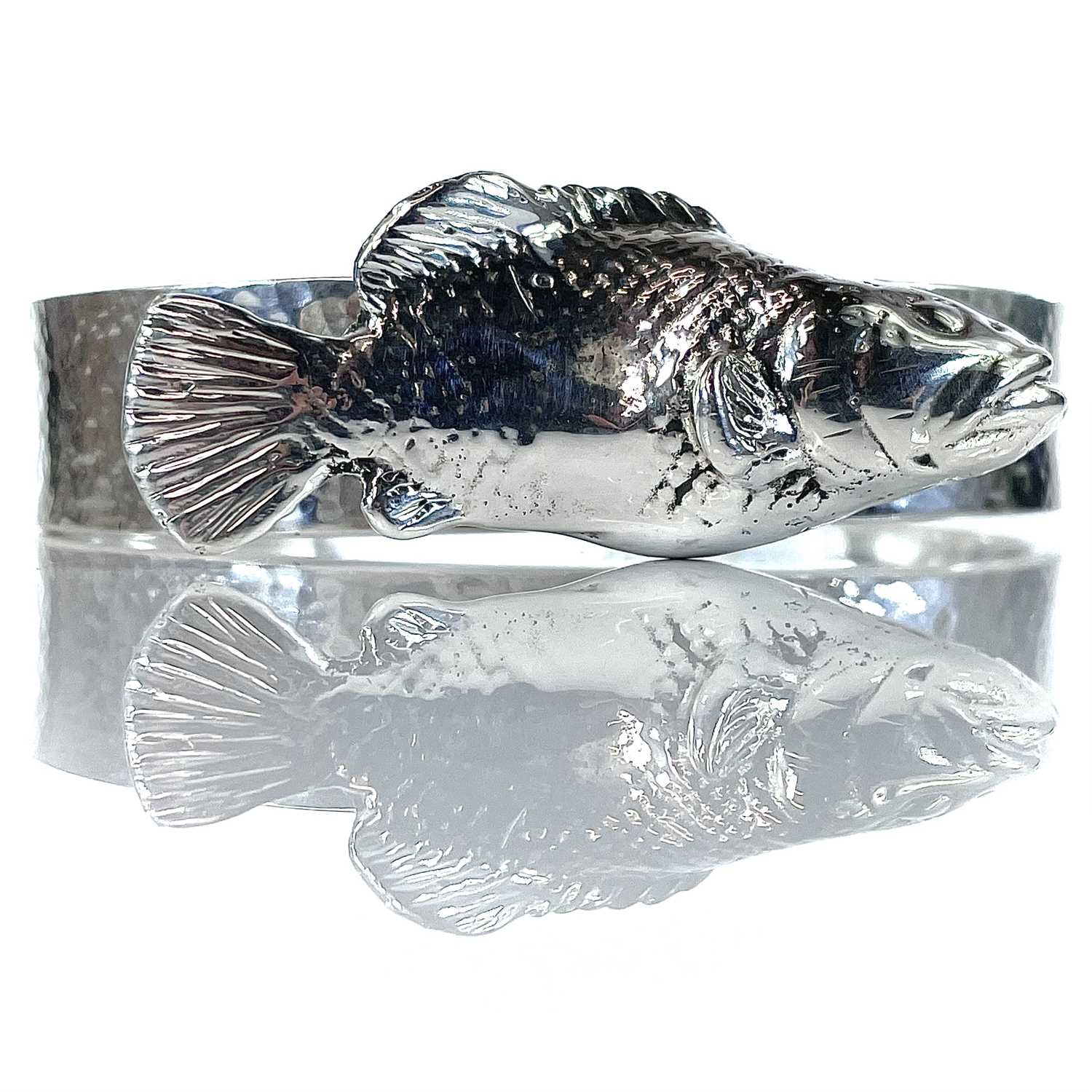 Lot 288 - A 999 fine silver bangle by James Suddaby,...